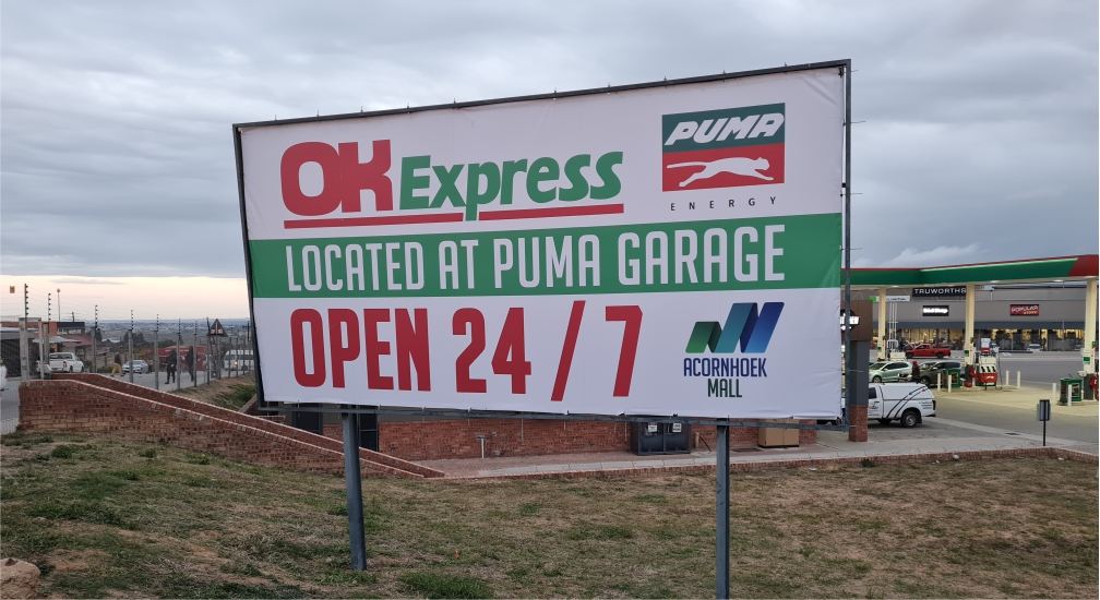 Large format banner at Puma Garage, Acornhoek Mall